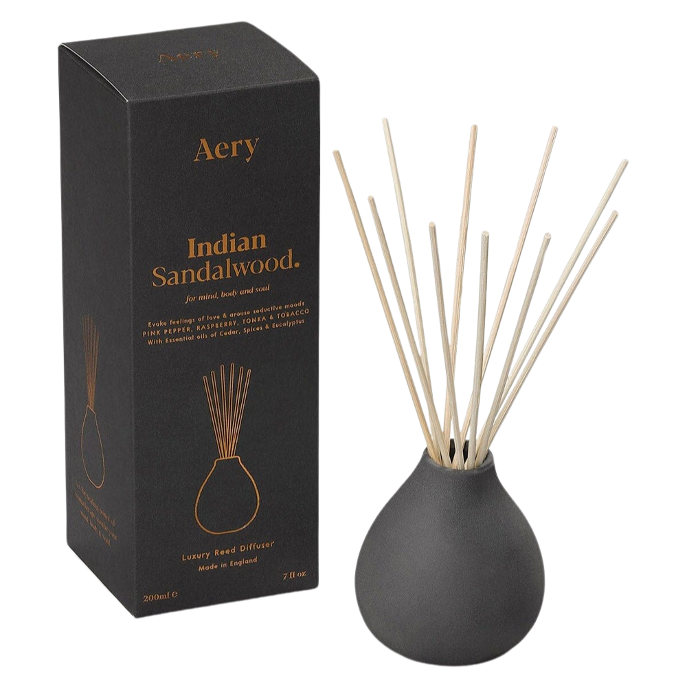 Aery Indian Sandalwood diffuser with packaging on a white background