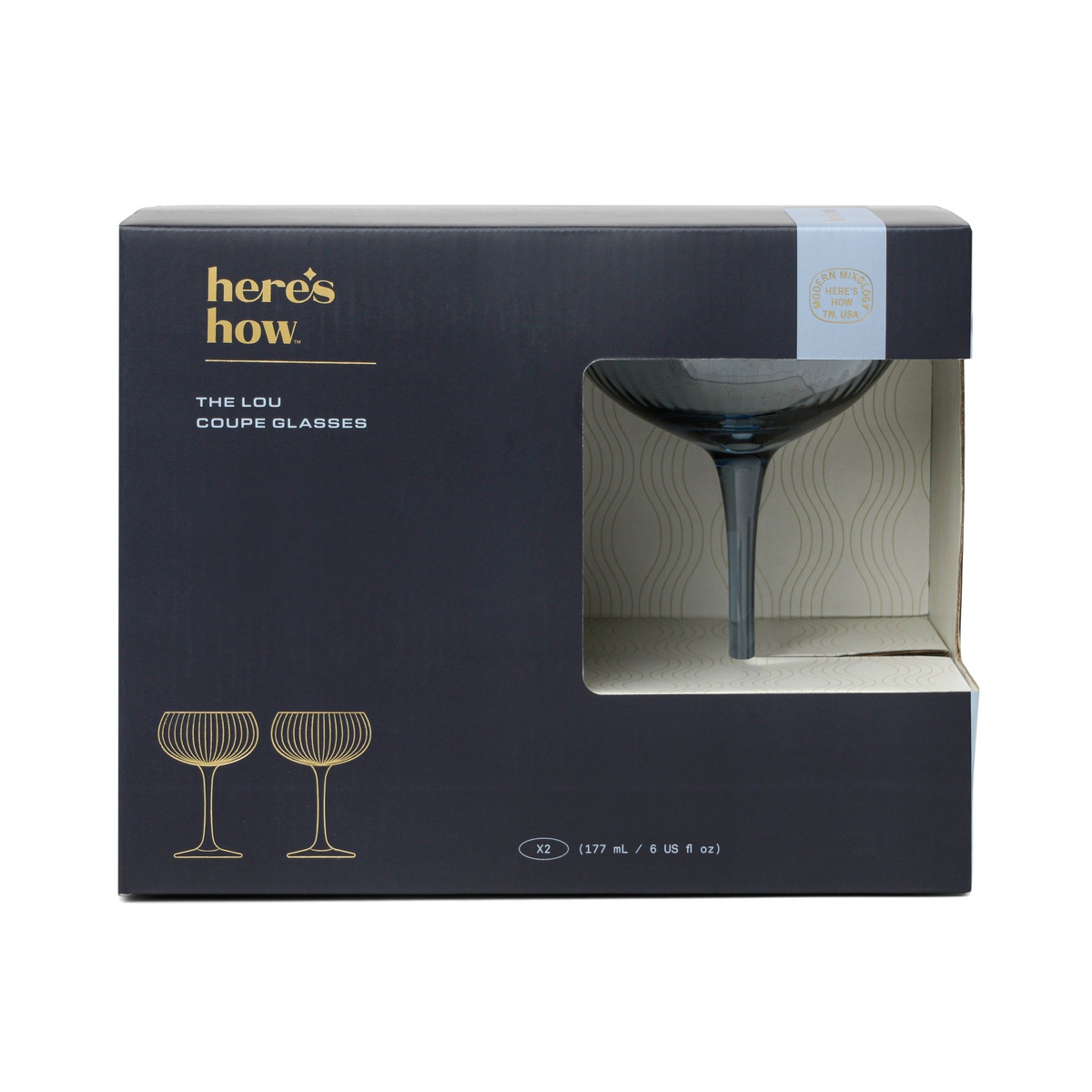 Boxed set of 'The Lou Coupe Glasses' by 'here's how' on a white background